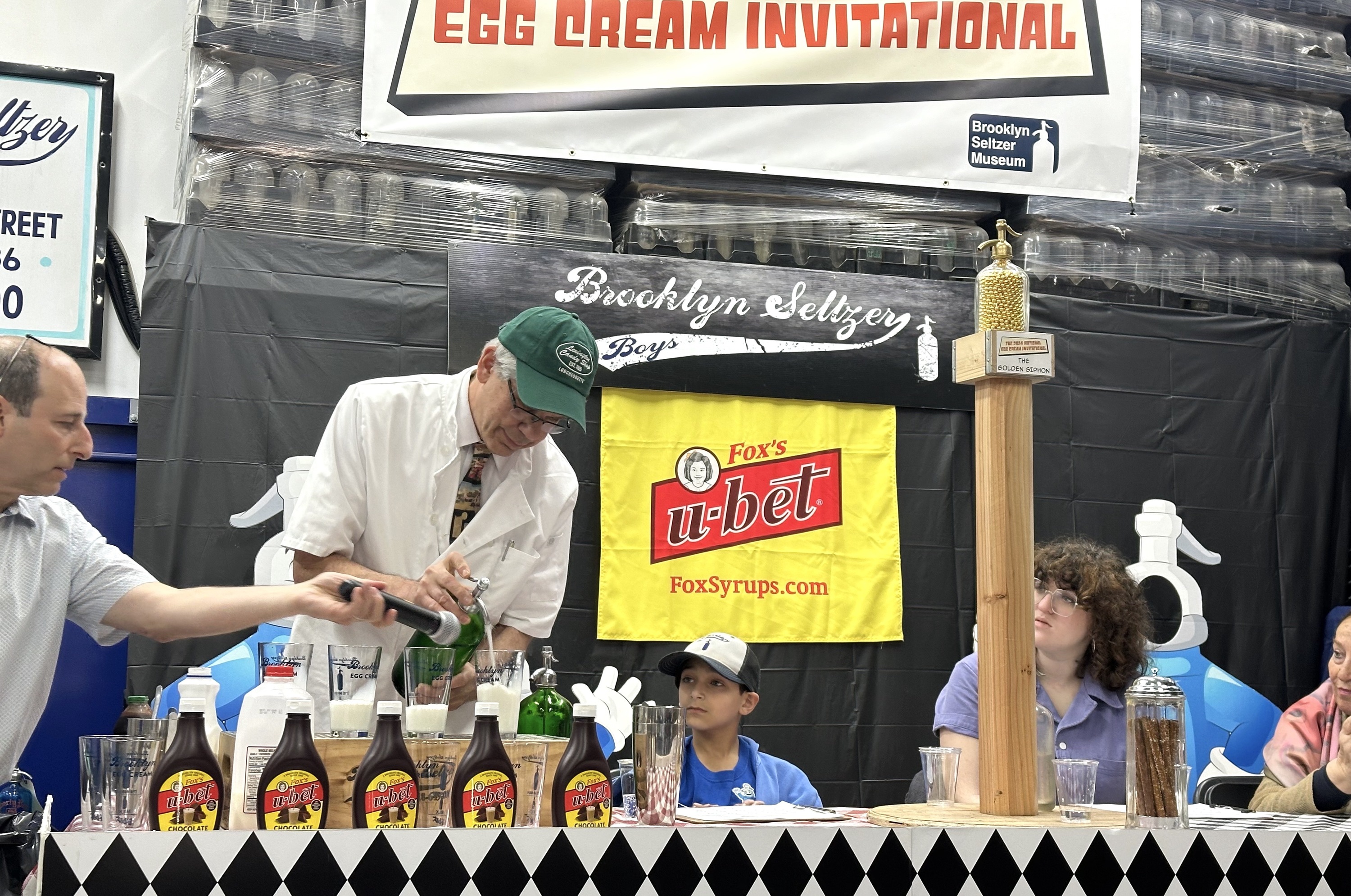 A man from Lexington Avenue Candy Shop makes an egg cream.