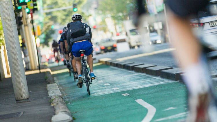Bike riders using bike lane on William Street in Sydney