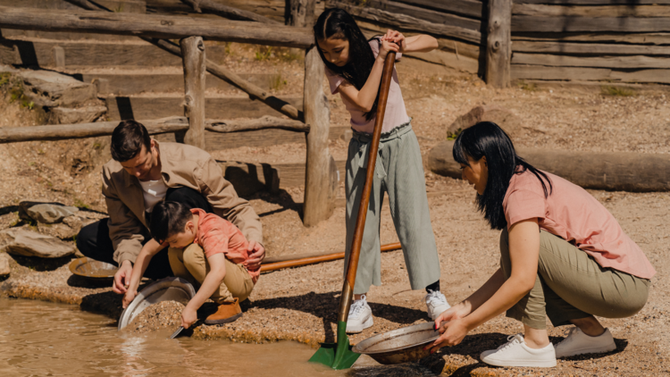 Family doing gold panning