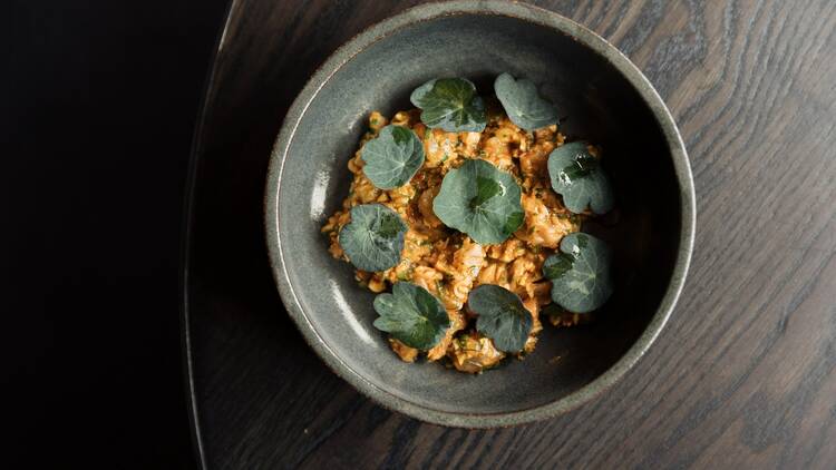 A bowl of suzuki tartare