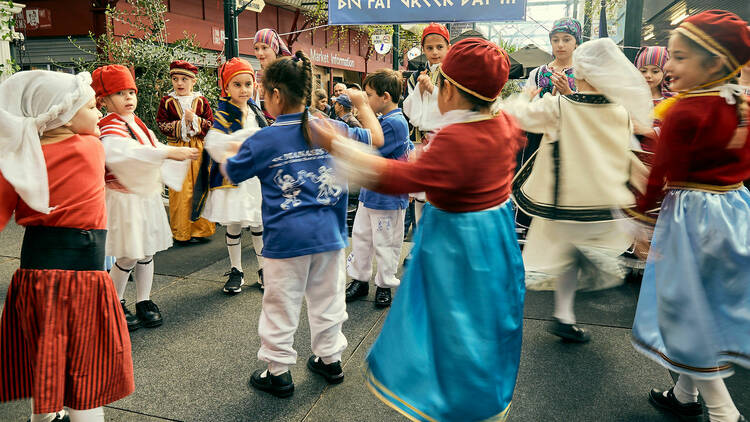 Children in traditional Greek clothing. 