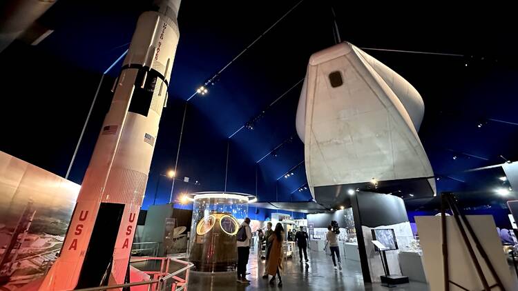 Space ships inside the Apollo exhibit.