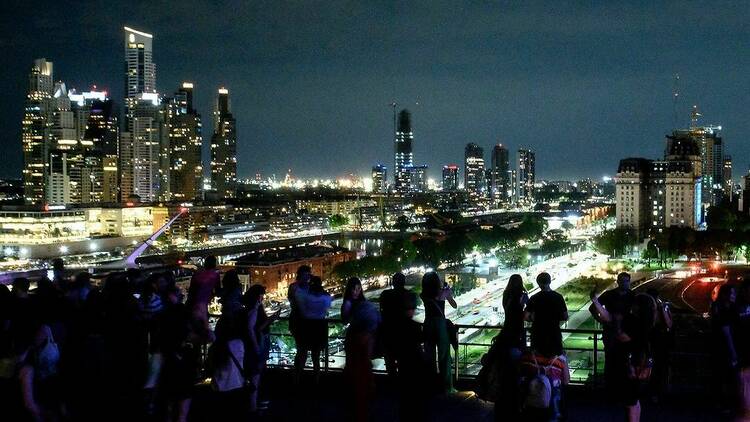 Watching the city at night from the dome of the Kirchner Cultural Center