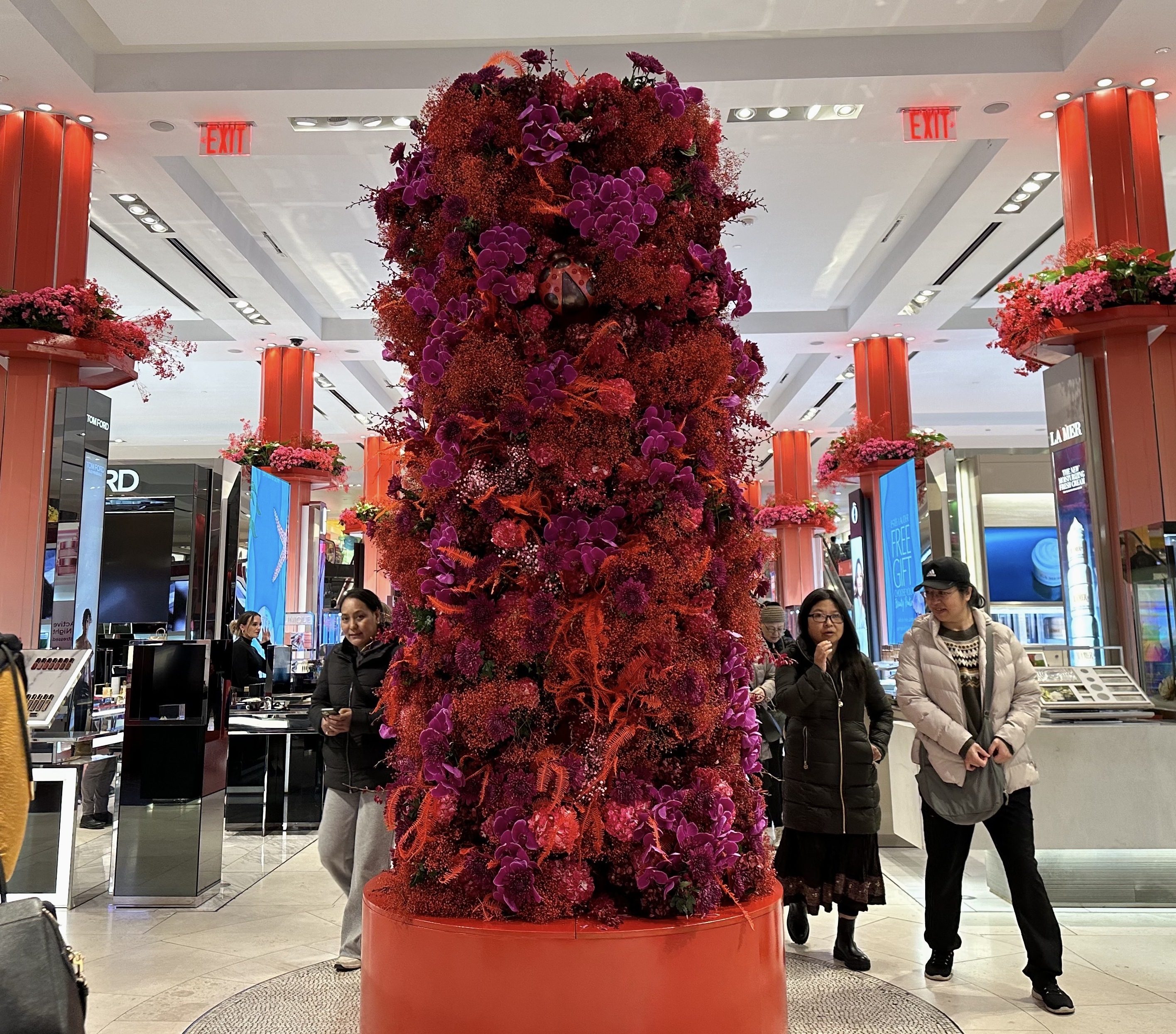 A pillar of red and purple flowers.