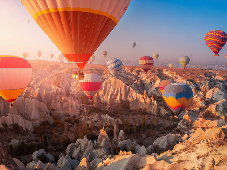 Feel like you’re in a fairytale by flying over Turkey’s Cappadocia in a hot air balloon