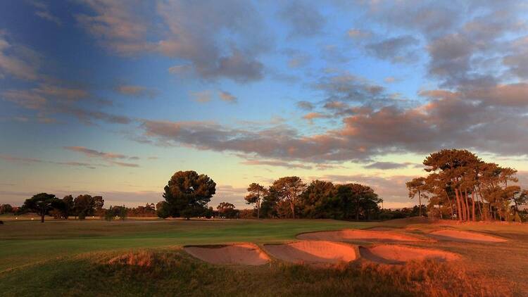 Sunsetting over a golf course