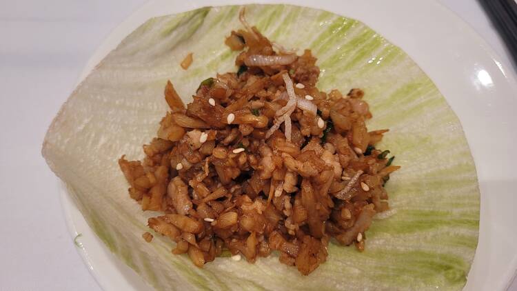 pork mince piled on top of a lettuce cup
