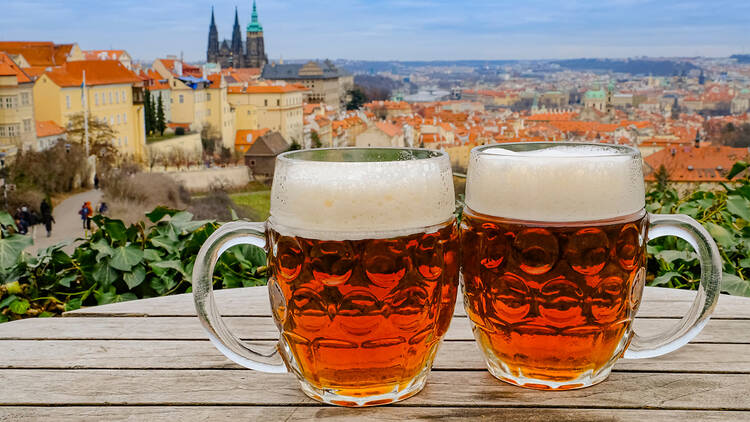 Two mugs of Czech beer in Prague