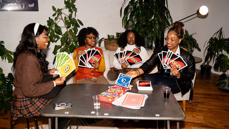 A group plays giant Uno at the first Brooklyn Yearbook event.