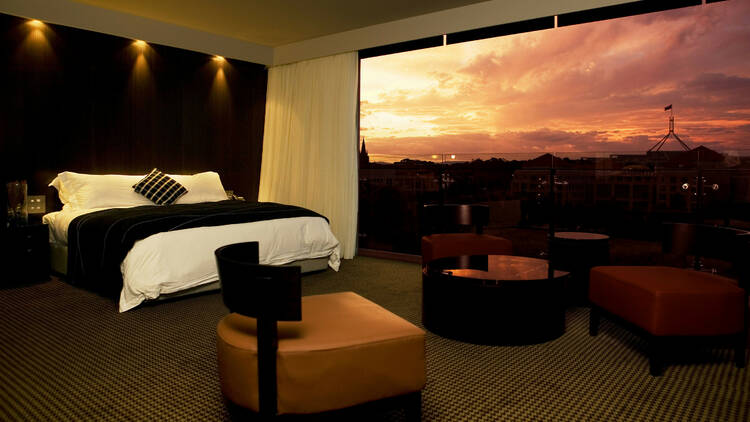 View from a suite at the Hotel Realm at sunset with Telstra Tower in the background. Hotel Realm is located near the Parliamentary Triangle and offers 158 hotel and suite style accommodation.