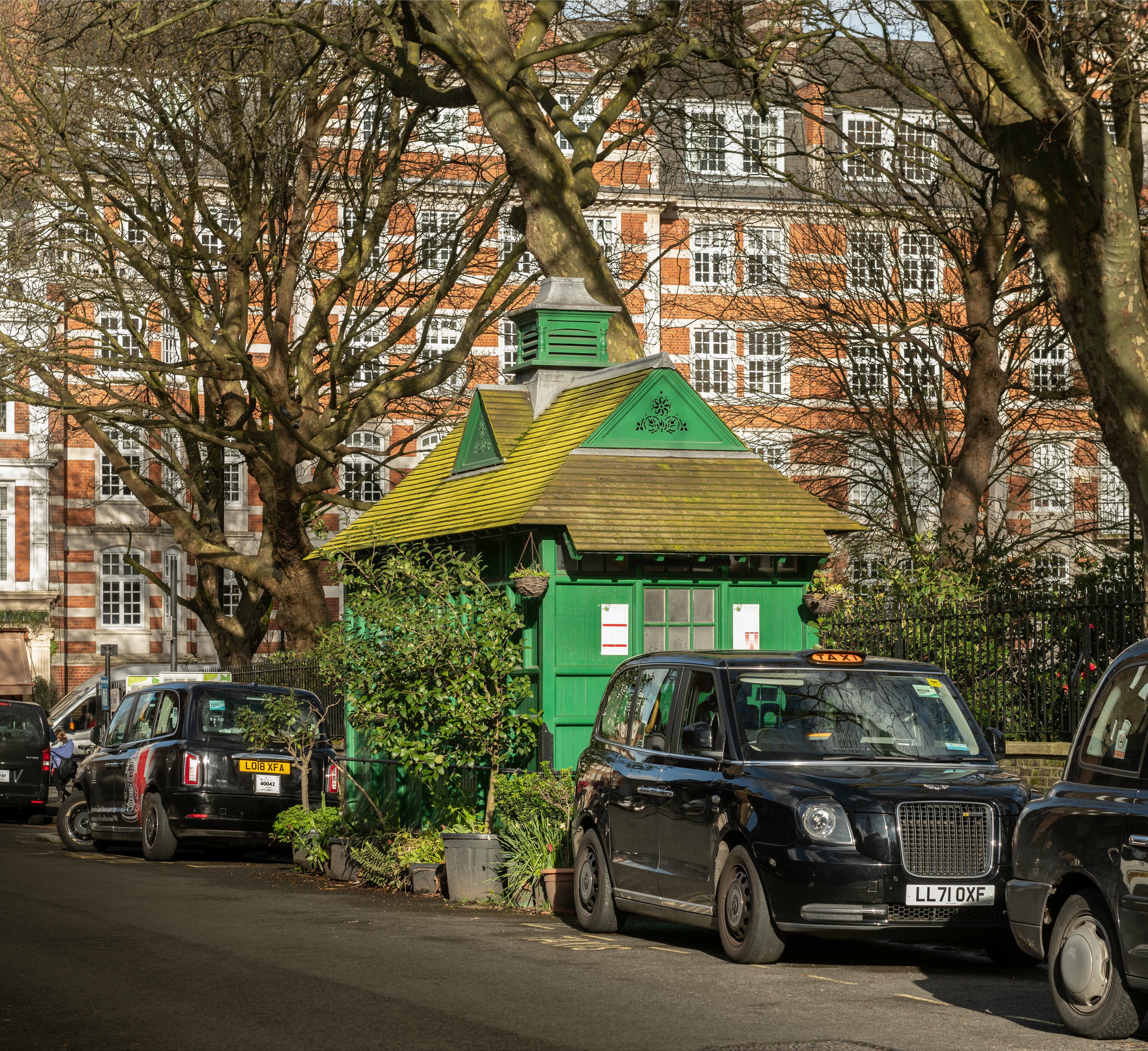 Listing.Cabmens Shelter, Wellington Place, St John's Wood, City Of Westminster, Greater London.View from north west.