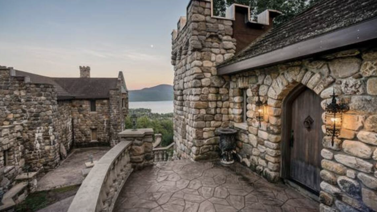 Side entrance to castle overlooking vistas of Lake George in Bolton