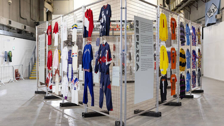 Vintage Umbro tracksuits in display in an exhibition 