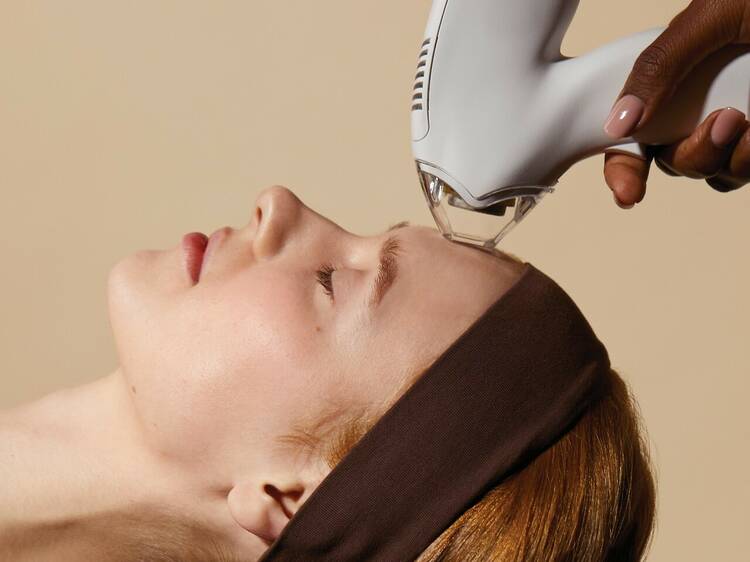 A woman having a laser facial at Skin Laundry