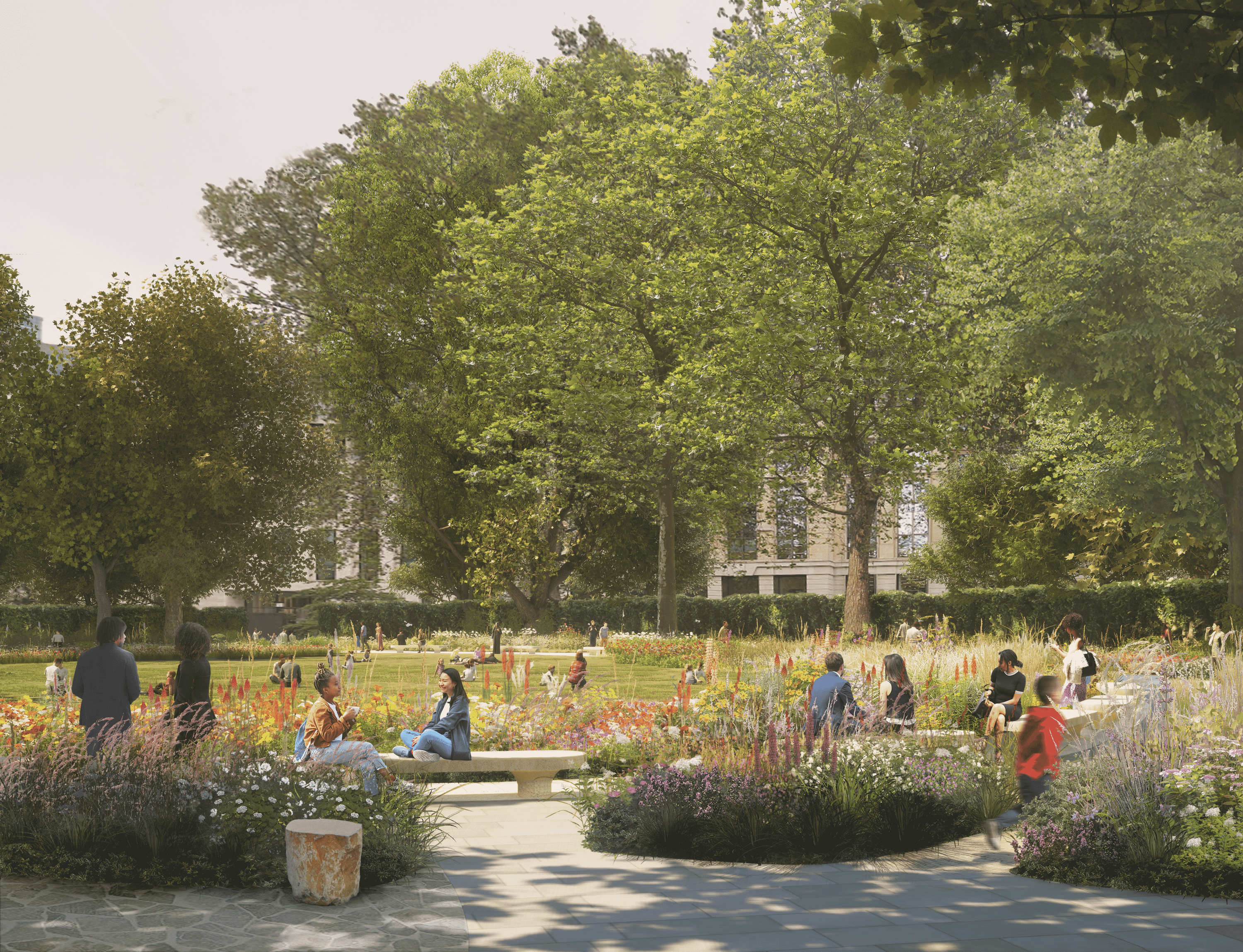 A park with big trees, benches and a pathway 