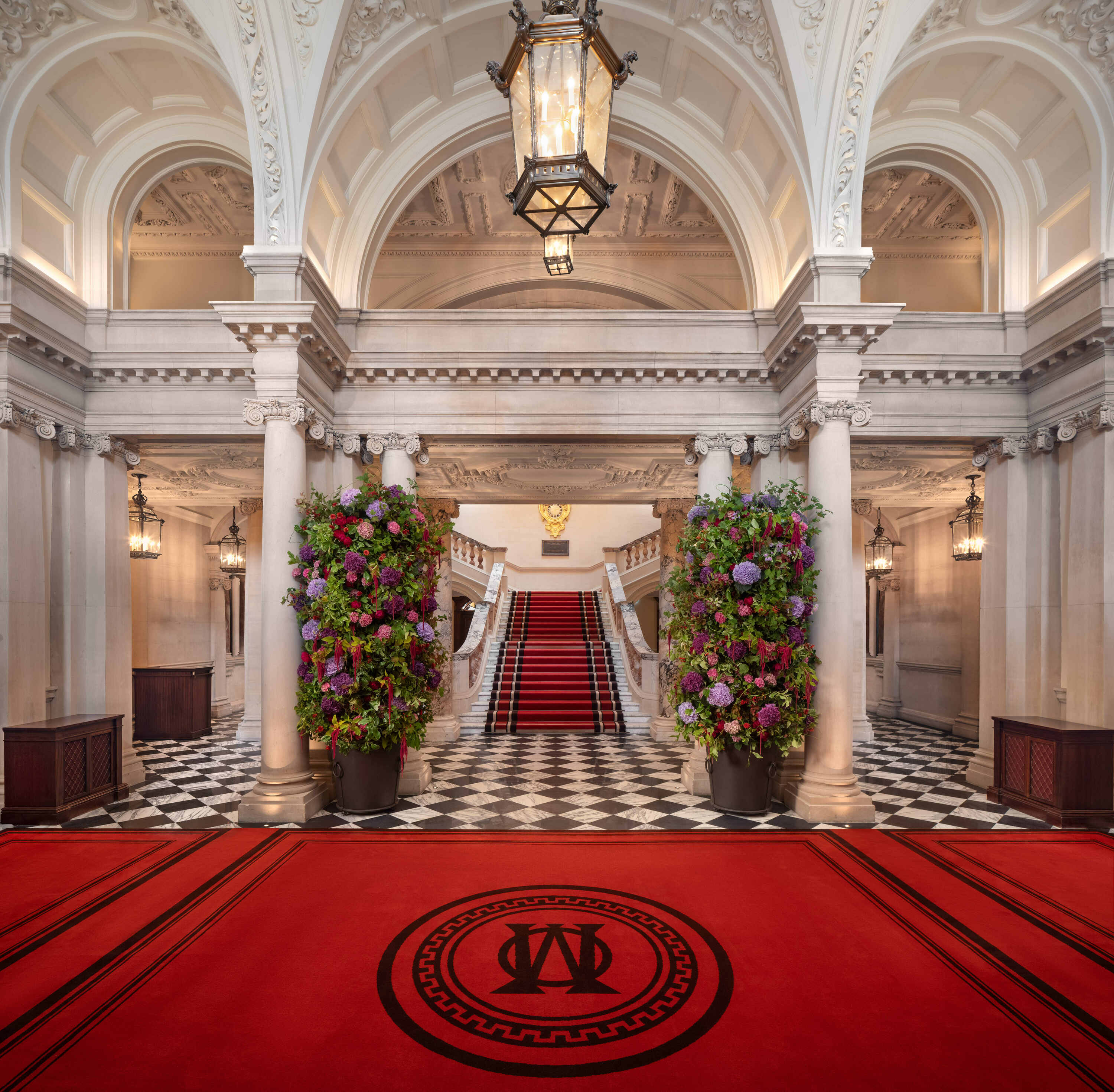 OWO bldg, red carpeted hall and grand stair