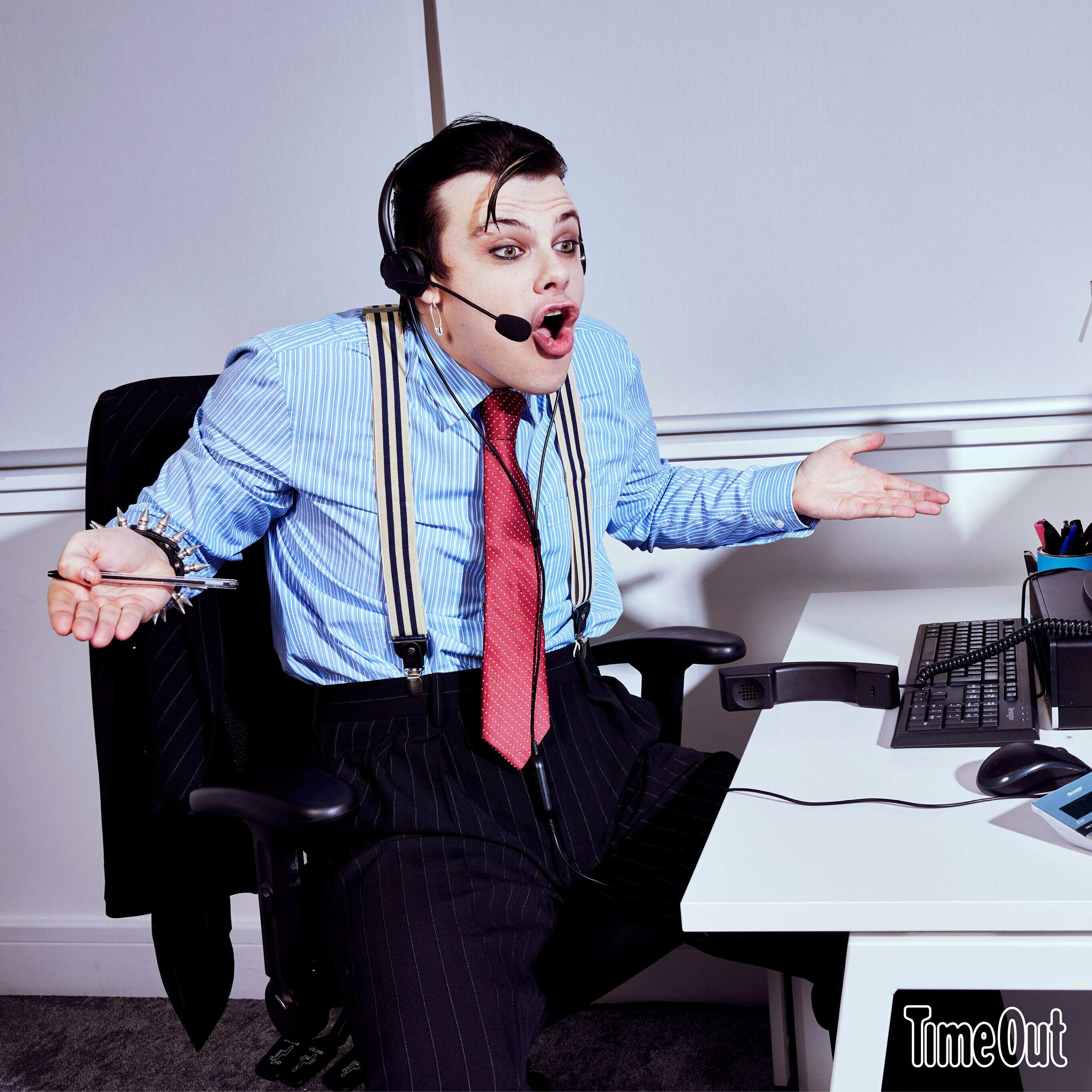 Yungblud sitting at a desk with a headset