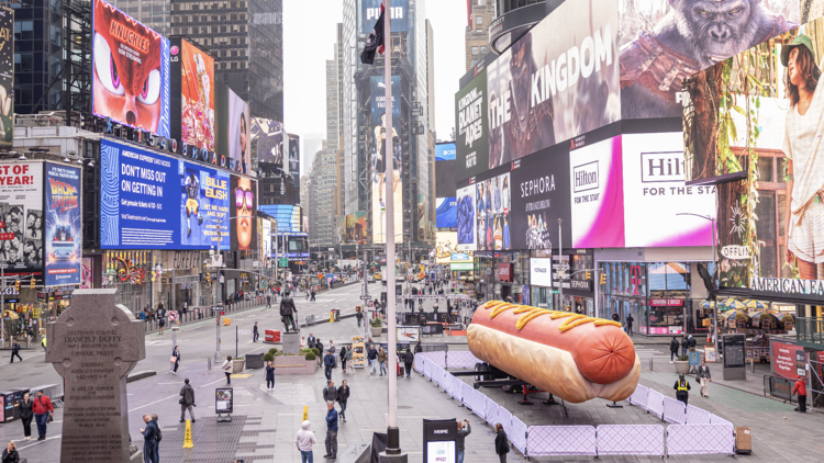 An enormous hot dog has taken up residence in the middle of Times Square