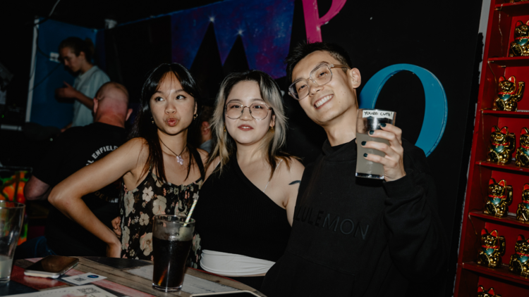 Three people with drinks