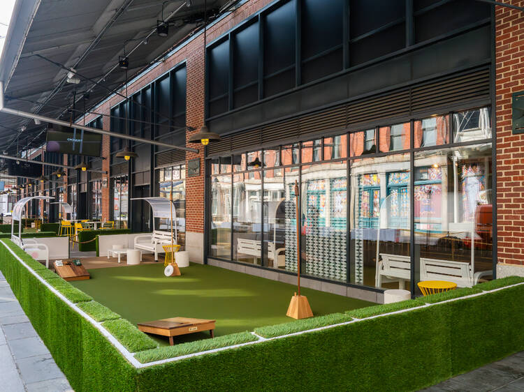 Exclusive: The outdoor Lawn Club with TV screens and more just opened by the Seaport
