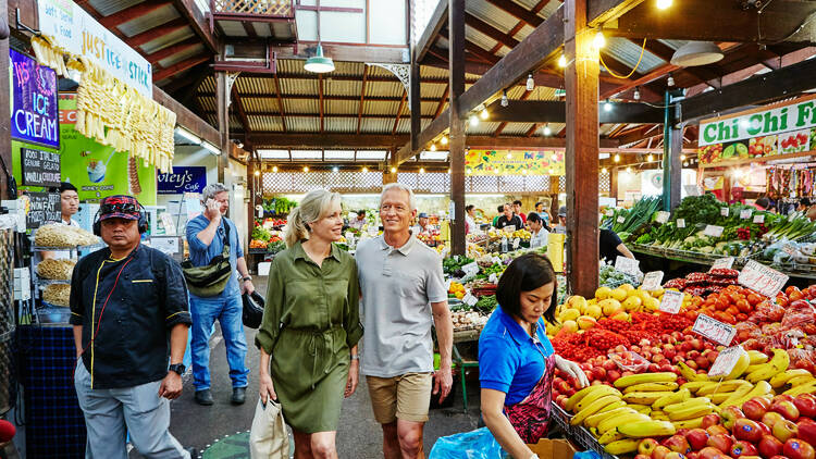 Couple shopping for fresh produce at the Fremantle Markets