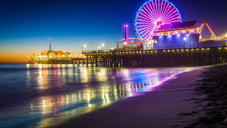 Ride a Ferris wheel overlooking the Pacific Ocean