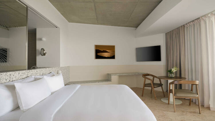 Hotel room with white furnishing