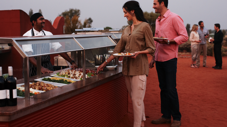 Couple at buffet in the desert