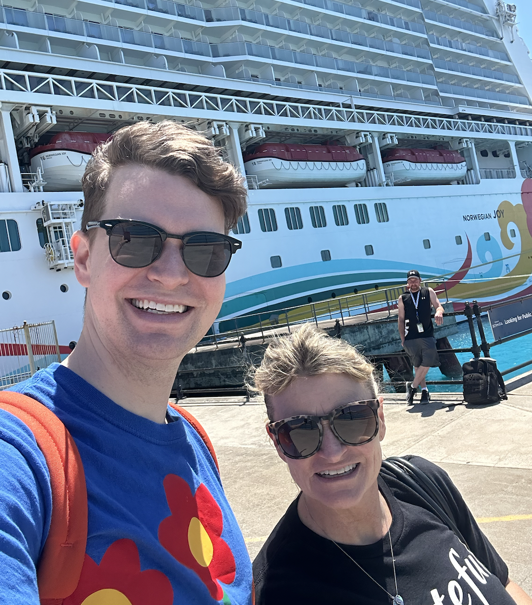 Zach Zimmerman and his mom in front of the cruise ship