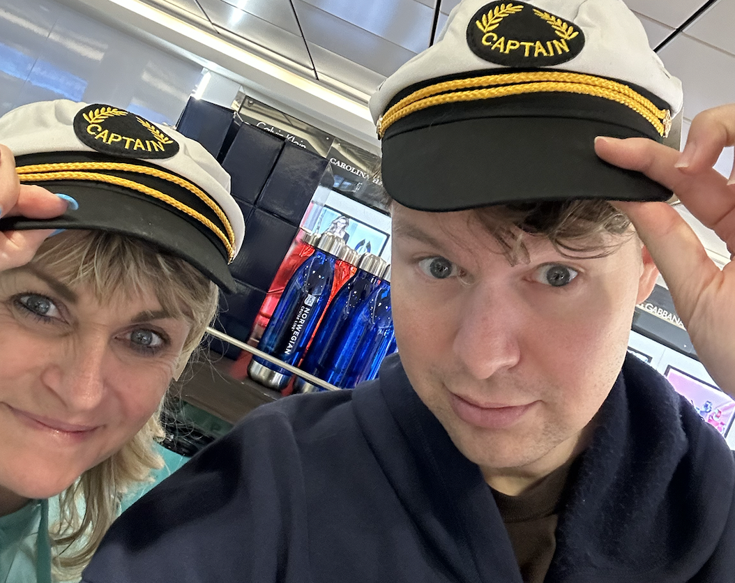 Zach Zimmerman and his mom wearing captain’s hats
