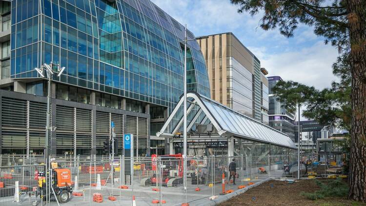 The entrance of Parkville Station with fencing up.
