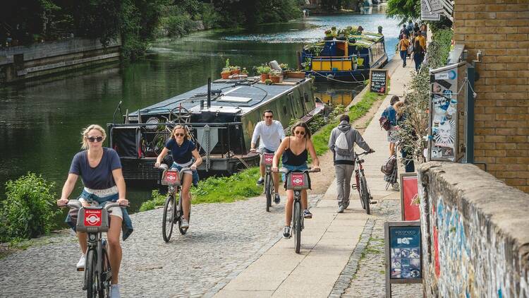 People cycling along the Regent's Canal in Hackney