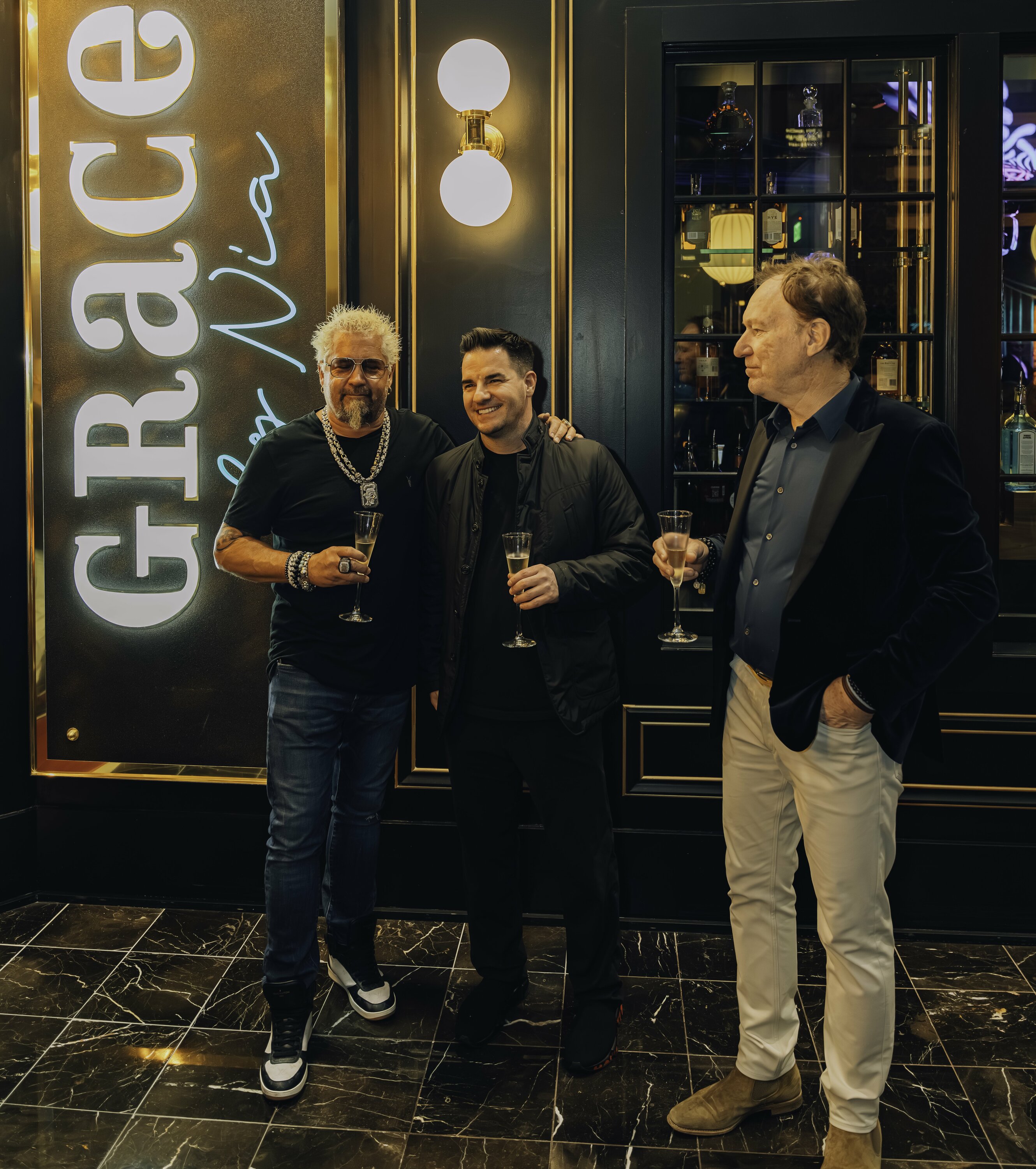 (L to R) Guy Fieri with Big Night Entertainment partners Randy Greenstein and Ed Kane at Grace by Nia at Foxwoods