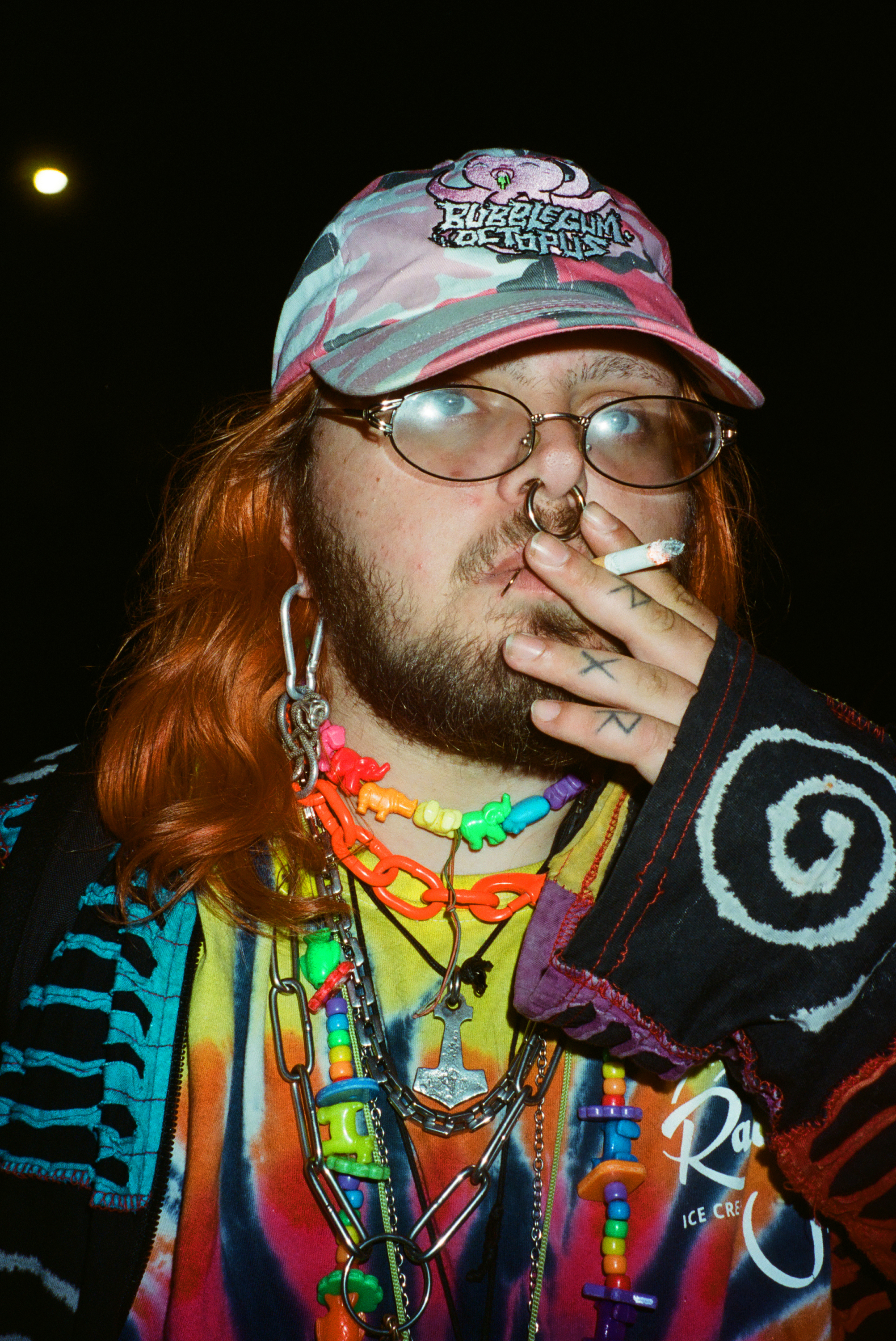 close up of person smoking a cigarette