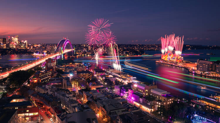 Sydney Harbour lit up by Vivid lights and fireworks