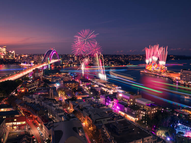 Sydney Harbour lit up by Vivid lights and fireworks