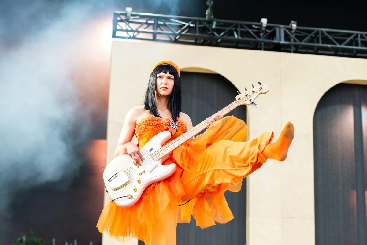 Khruangbin's bassist, Laura Lee, captivates the audience with her moves at Boston Calling on Saturday, May 25, 2024.