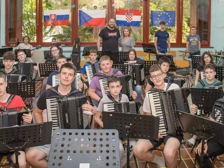 Youth accordion orchestra takes over a main square in Poreč