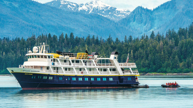 Guests explore by zodiac from the ship National Geographic Sea Bird, Tongass National Forest, Southeast Alaska, USA