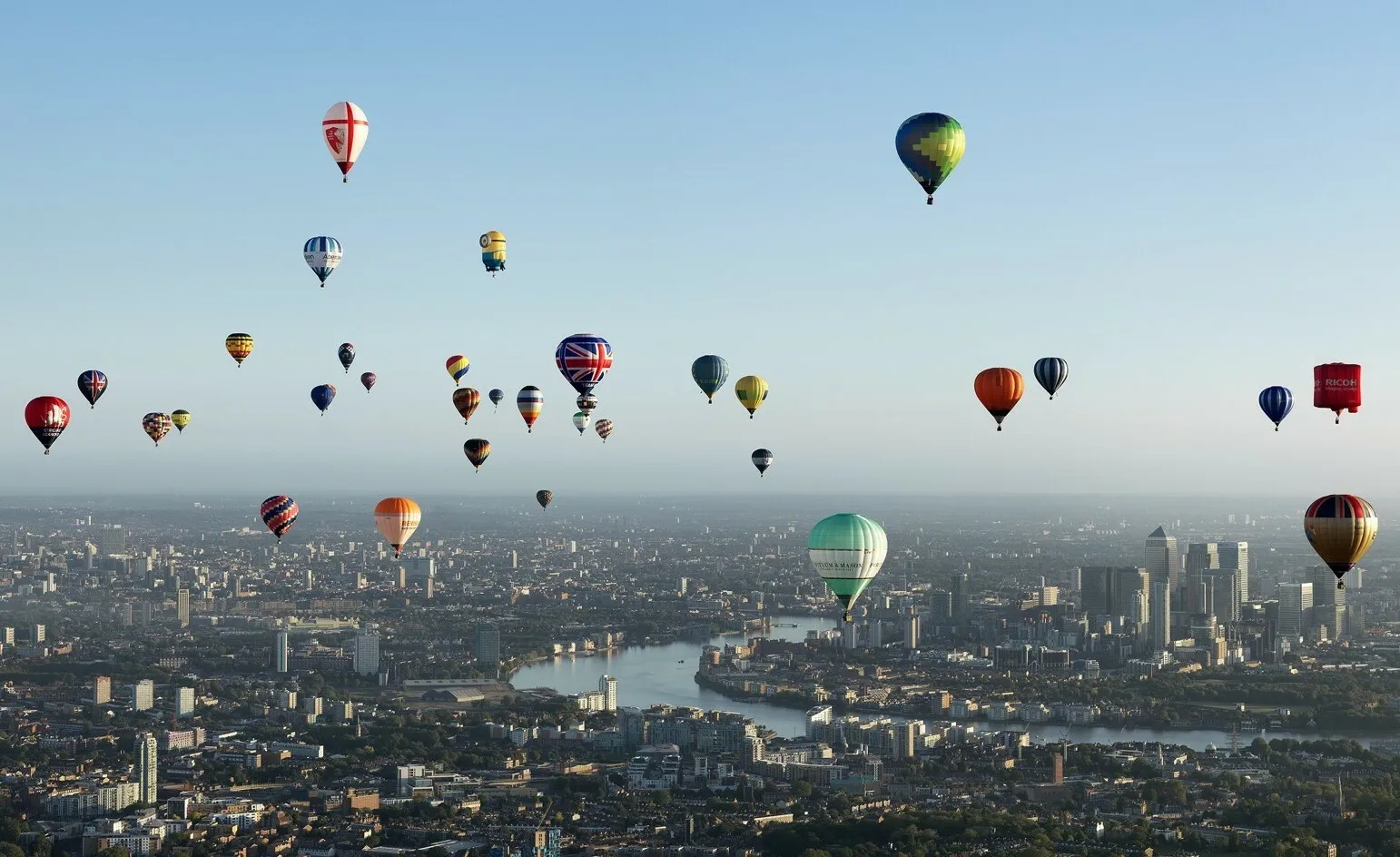Lord Mayor’s Hot Air Balloon Regatta in London, with hot air balloons flying high above the city