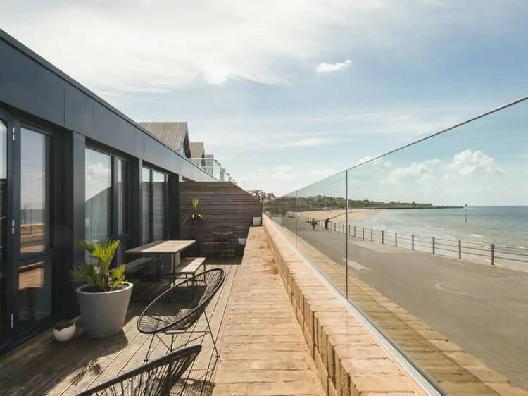 The minimalist beach house with a balcony