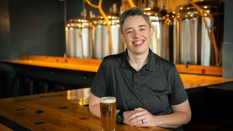 Drawdown Brewing Company owner Liz Nicol has a beer at the bar.