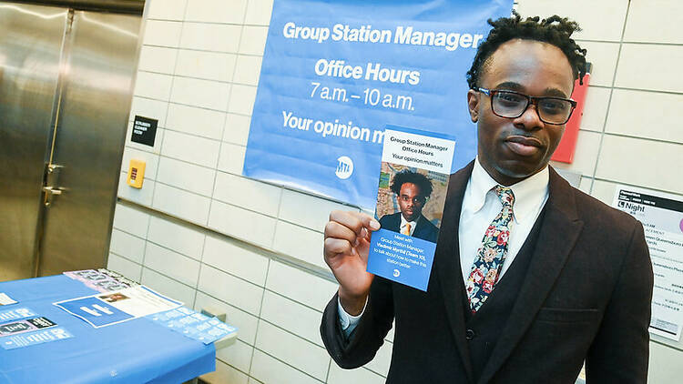 A person holding a flyer for MTA office hours