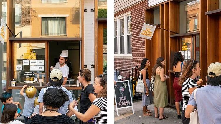 People line up at an ice cream window.