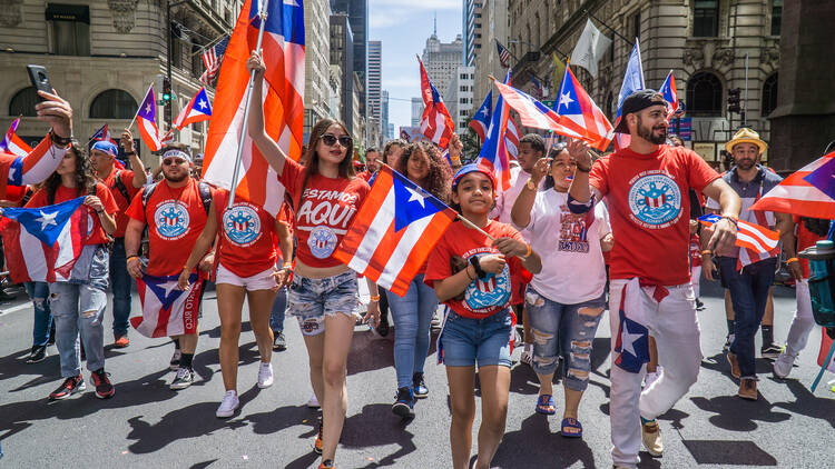 People march in the National Puerto Rican Day Parade.