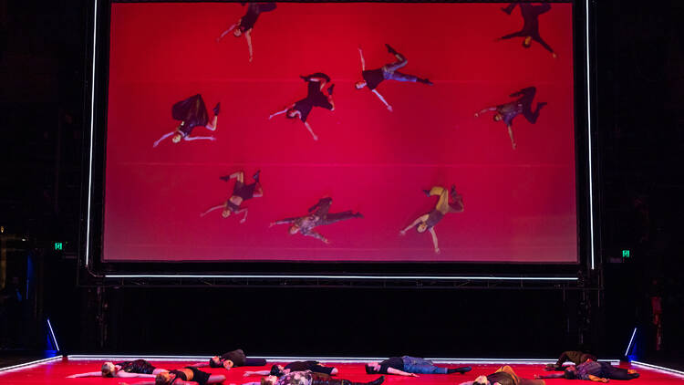 Dancers playing dead on the floor