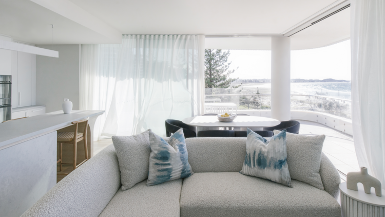 Stylish living room with grey couch