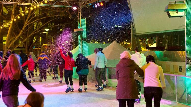 People ice skating. 