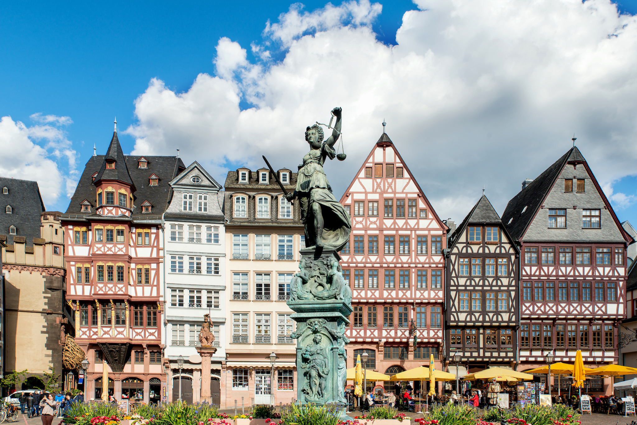 Old town square romerberg with Justitia statue in Frankfurt, Germany.