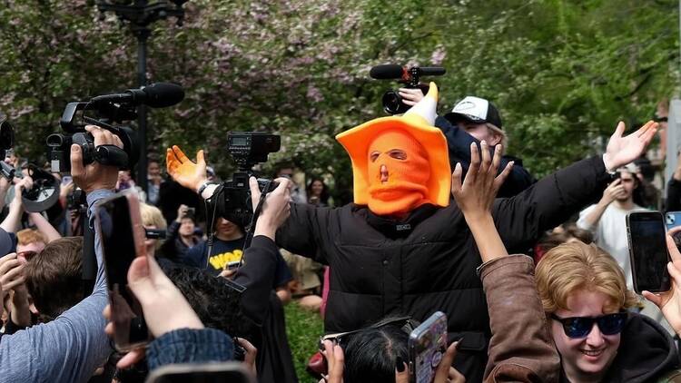 person with an orange mask